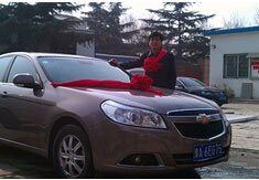 超前涂料獎勵員工轎車，真石漆生產(chǎn)廠家！